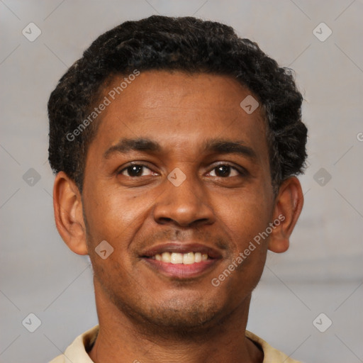 Joyful latino young-adult male with short  brown hair and brown eyes