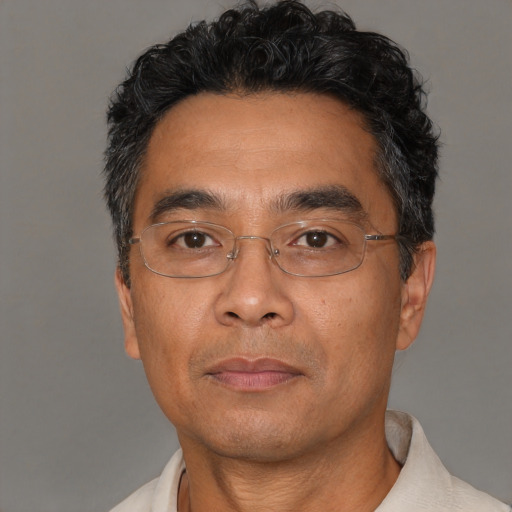 Neutral white adult male with short  black hair and brown eyes