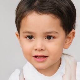 Joyful white child male with short  brown hair and brown eyes