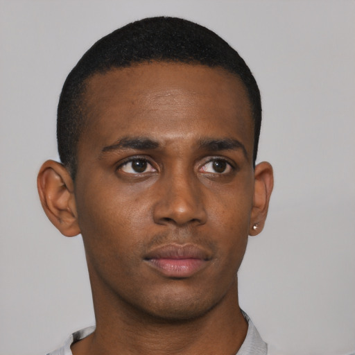 Neutral black young-adult male with short  black hair and brown eyes