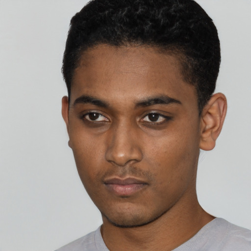 Neutral black young-adult male with short  black hair and brown eyes