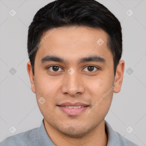 Joyful white young-adult male with short  black hair and brown eyes