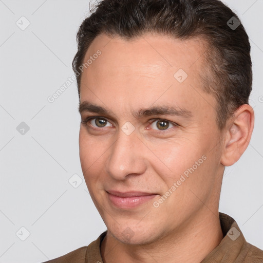 Joyful white young-adult male with short  brown hair and brown eyes