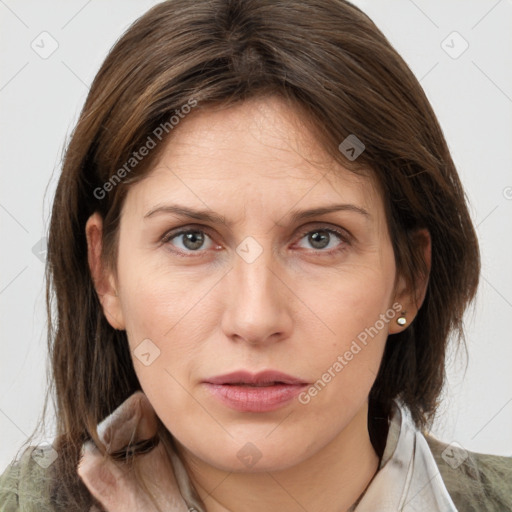 Neutral white young-adult female with medium  brown hair and grey eyes