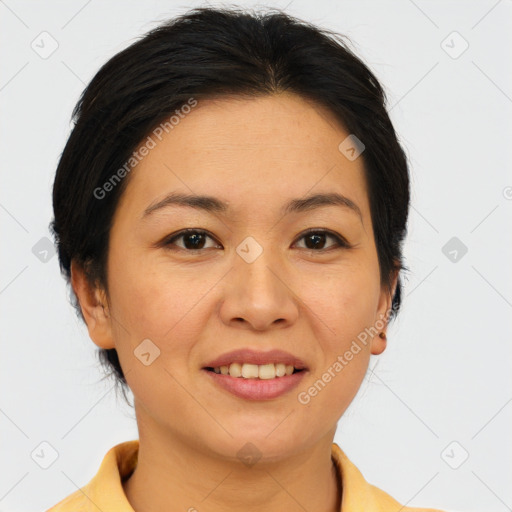 Joyful asian young-adult female with short  brown hair and brown eyes