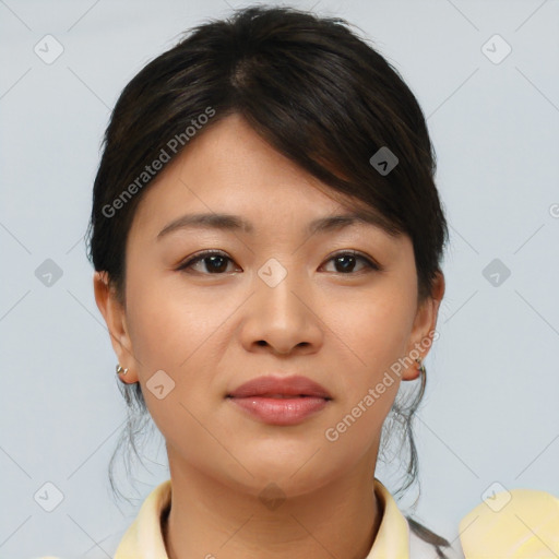 Joyful asian young-adult female with short  brown hair and brown eyes