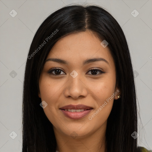 Joyful latino young-adult female with long  black hair and brown eyes