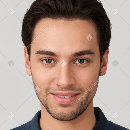 Joyful white young-adult male with short  brown hair and brown eyes