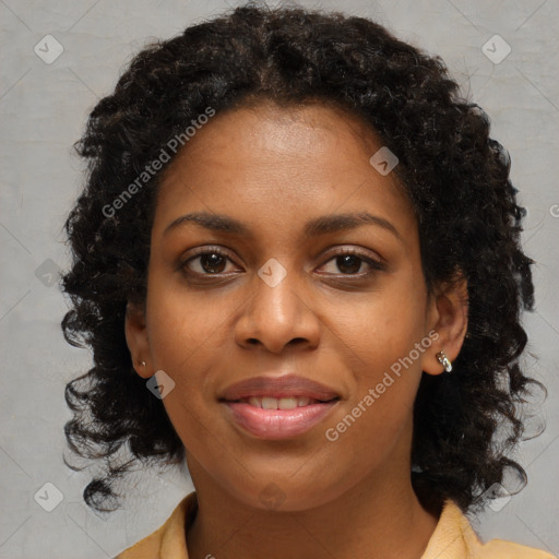 Joyful black young-adult female with medium  brown hair and brown eyes