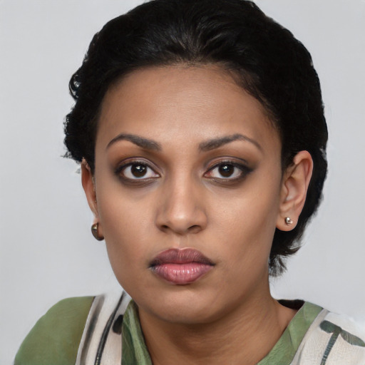 Neutral latino young-adult female with short  black hair and brown eyes