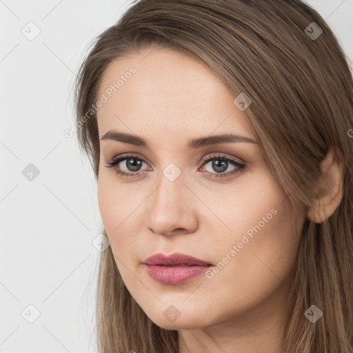 Neutral white young-adult female with long  brown hair and brown eyes