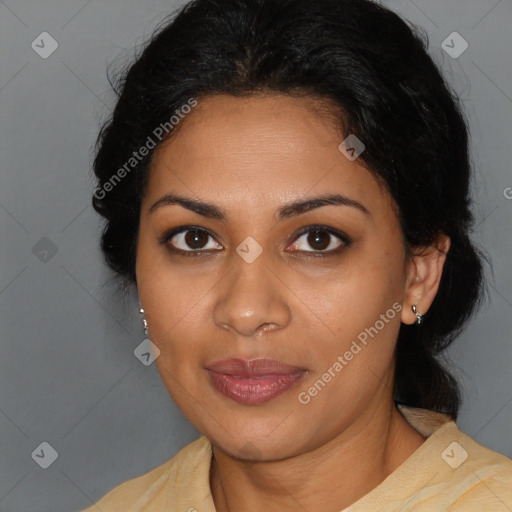 Joyful latino young-adult female with medium  brown hair and brown eyes
