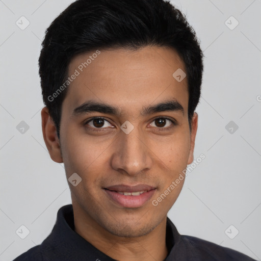 Joyful latino young-adult male with short  black hair and brown eyes