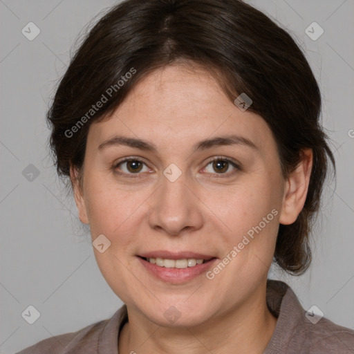 Joyful white adult female with medium  brown hair and brown eyes