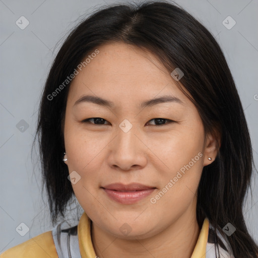 Joyful asian young-adult female with medium  brown hair and brown eyes