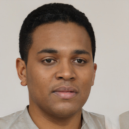 Neutral black young-adult male with short  brown hair and brown eyes