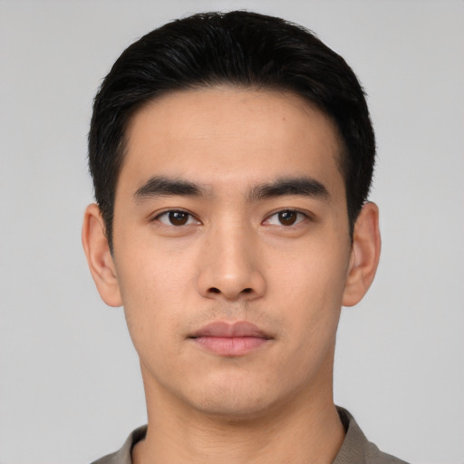 Neutral asian young-adult male with short  black hair and brown eyes
