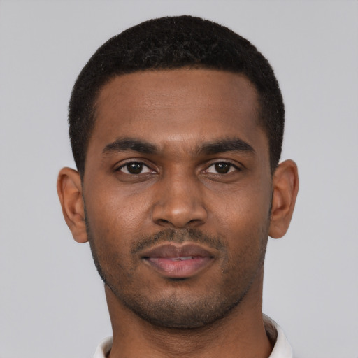 Neutral black young-adult male with short  black hair and brown eyes