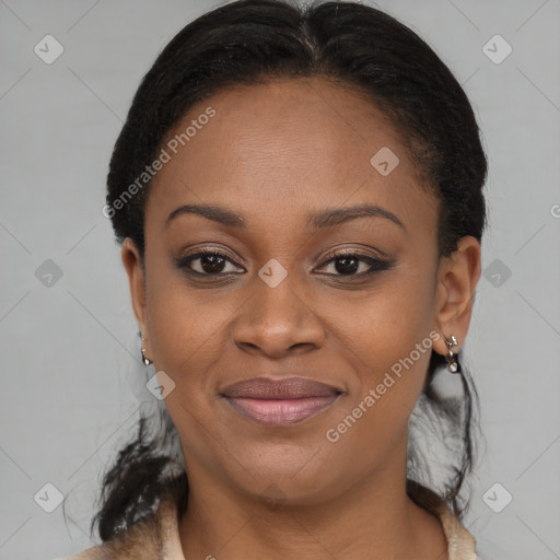 Joyful black young-adult female with medium  brown hair and brown eyes