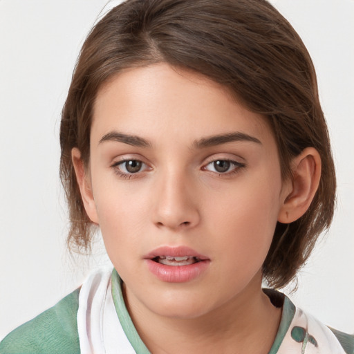 Neutral white young-adult female with medium  brown hair and green eyes