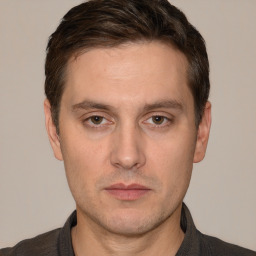 Neutral white adult male with short  brown hair and brown eyes