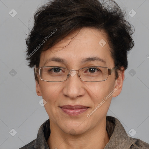 Joyful white adult female with short  brown hair and brown eyes