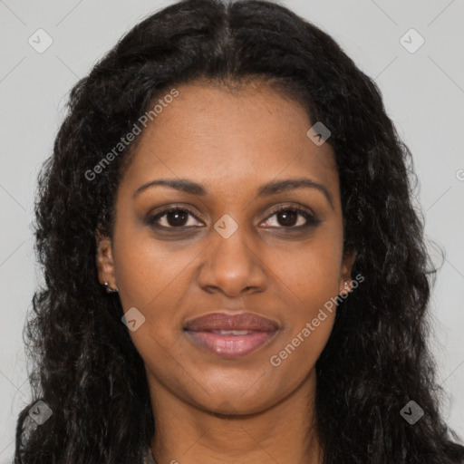 Joyful black young-adult female with long  brown hair and brown eyes