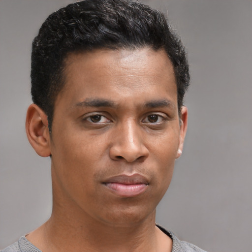 Neutral black young-adult male with short  brown hair and brown eyes