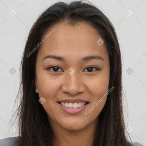 Joyful asian young-adult female with long  brown hair and brown eyes