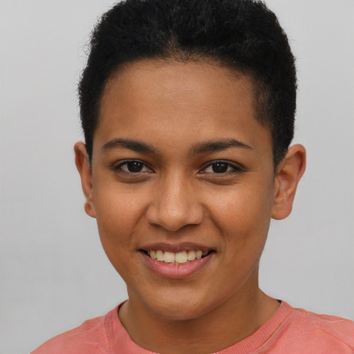 Joyful latino young-adult female with short  brown hair and brown eyes