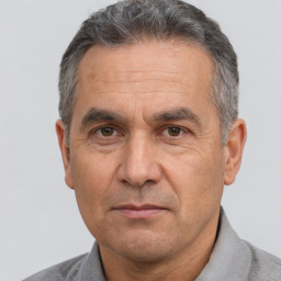 Neutral white middle-aged male with short  brown hair and brown eyes