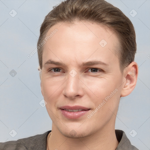 Joyful white young-adult female with short  brown hair and brown eyes