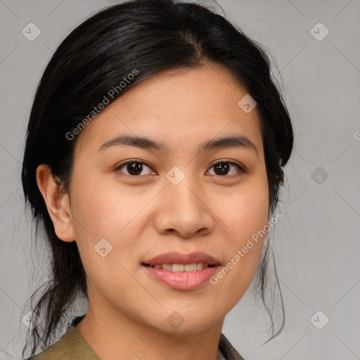 Joyful asian young-adult female with medium  brown hair and brown eyes