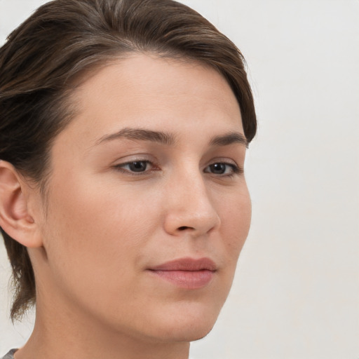 Neutral white young-adult female with short  brown hair and brown eyes