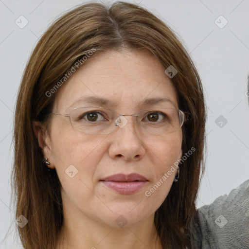 Joyful white adult female with medium  brown hair and grey eyes