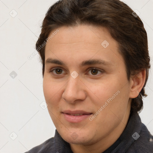 Joyful white adult female with short  brown hair and brown eyes