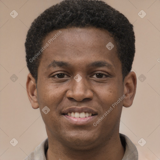 Joyful latino young-adult male with short  brown hair and brown eyes