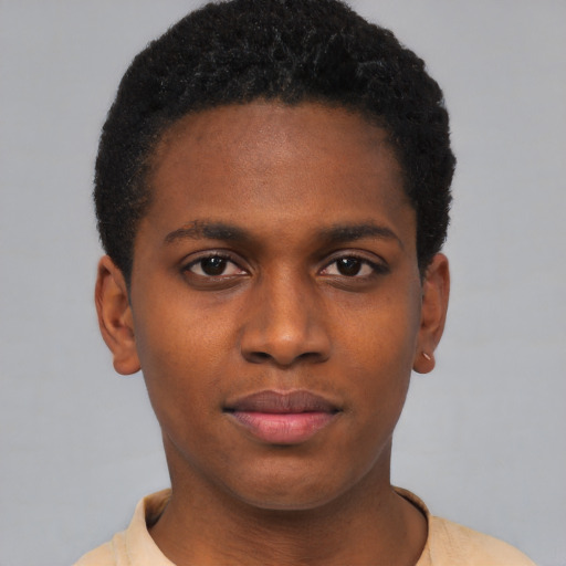 Joyful latino young-adult male with short  brown hair and brown eyes