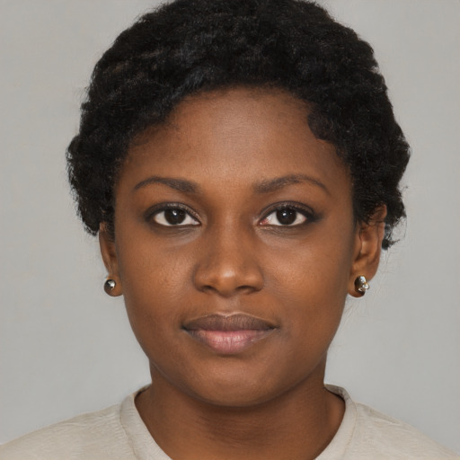 Neutral black young-adult female with short  brown hair and brown eyes