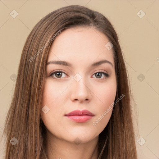 Neutral white young-adult female with long  brown hair and brown eyes