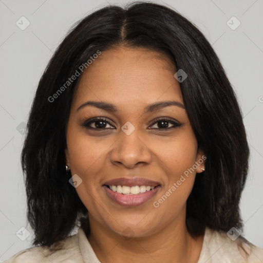 Joyful black adult female with medium  brown hair and brown eyes