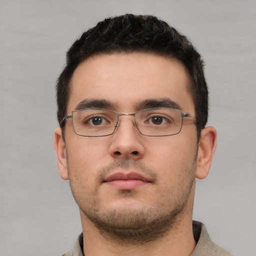 Neutral white young-adult male with short  brown hair and brown eyes