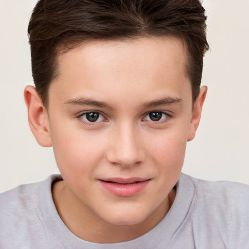 Joyful white child female with short  brown hair and brown eyes