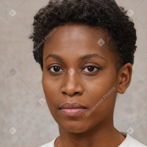 Neutral black young-adult female with short  brown hair and brown eyes