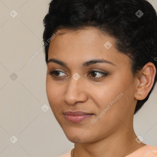 Joyful latino young-adult female with short  brown hair and brown eyes