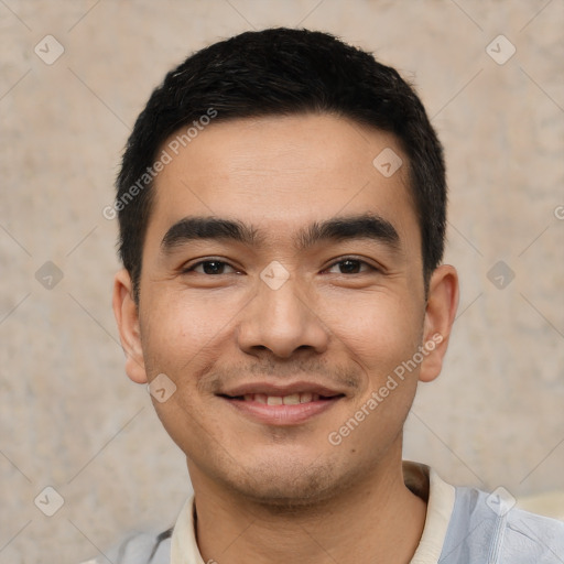 Joyful white young-adult male with short  black hair and brown eyes