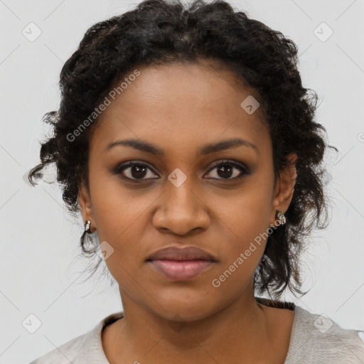 Joyful black young-adult female with medium  black hair and brown eyes