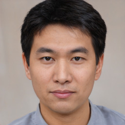 Neutral asian young-adult male with short  black hair and brown eyes