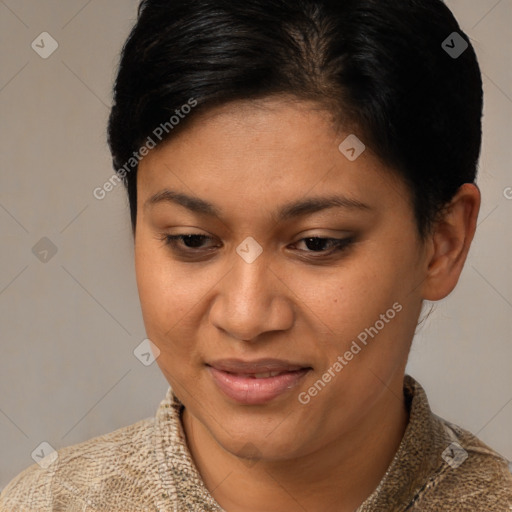 Joyful latino young-adult female with short  brown hair and brown eyes