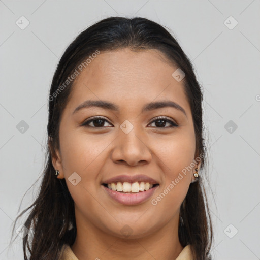 Joyful latino young-adult female with long  brown hair and brown eyes